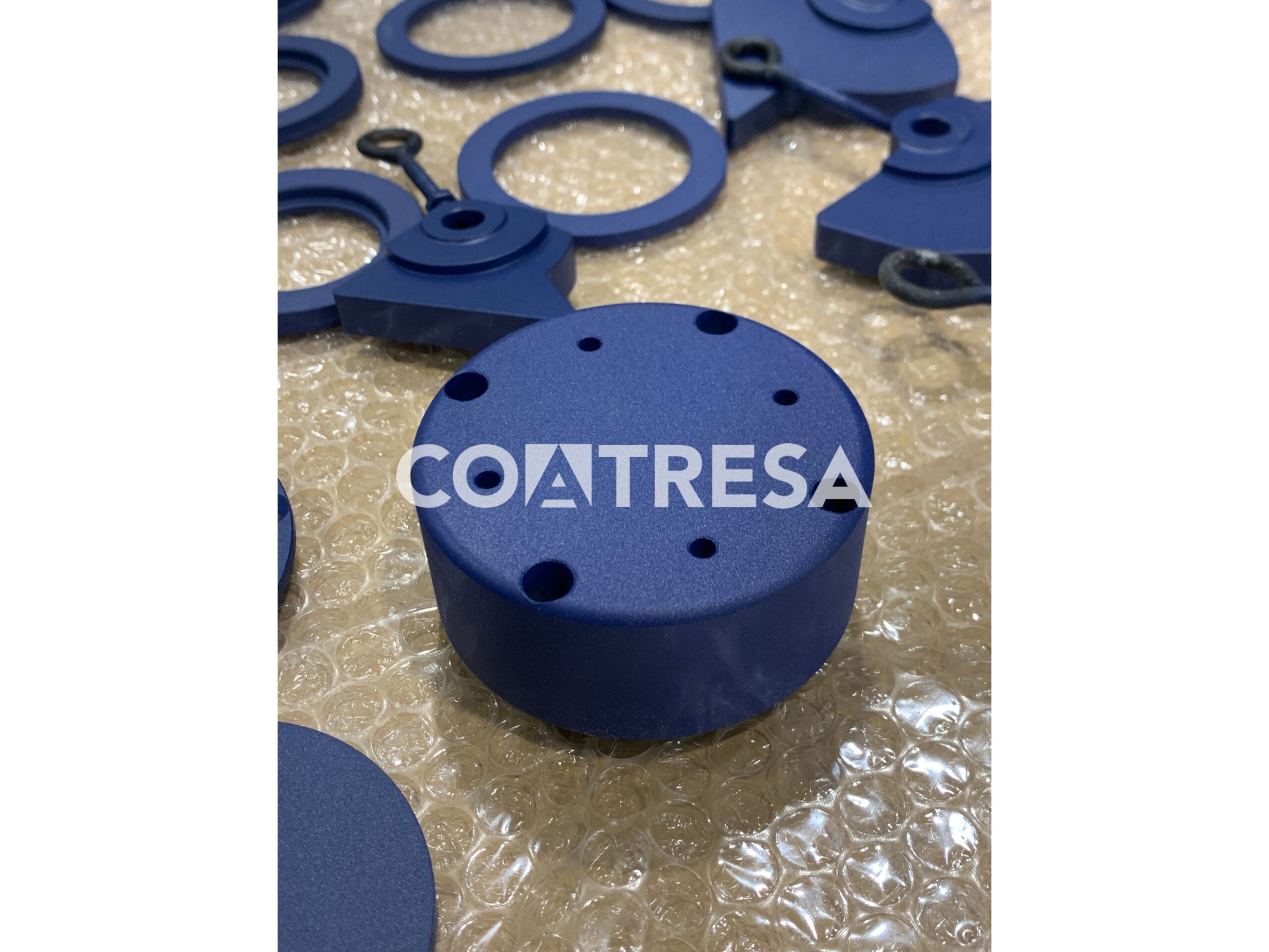 TEFLONADO AZUL DE PIEZAS MECANIZADAS